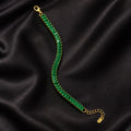 Gold bracelet with clear stones