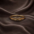 Gold bracelet with colored stones